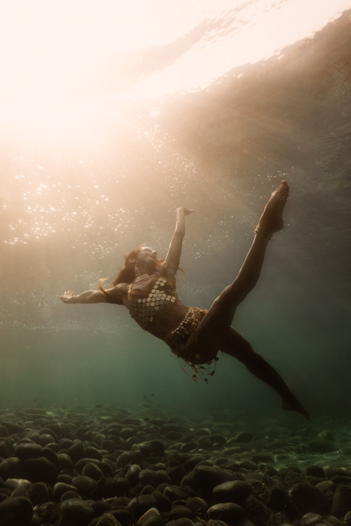 Artistic underwater photoshoot in the sea with natural textures